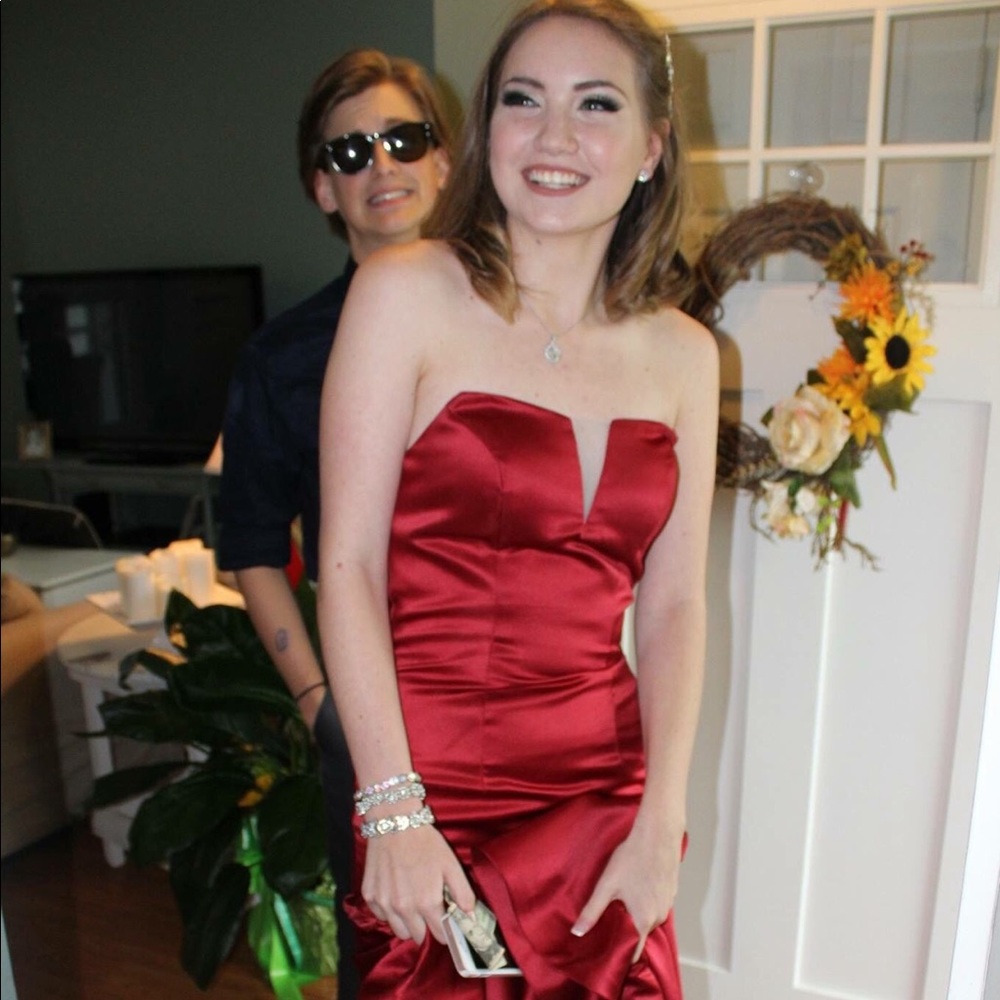 Strapless satin red prom dress.